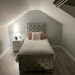 finished loft conversion with floor in place and furniture in place