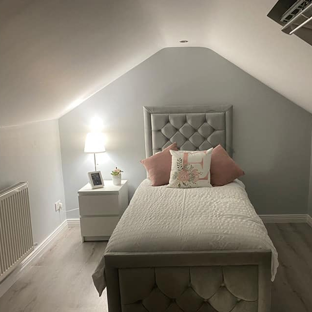 cropped pic of bed in loft conversion